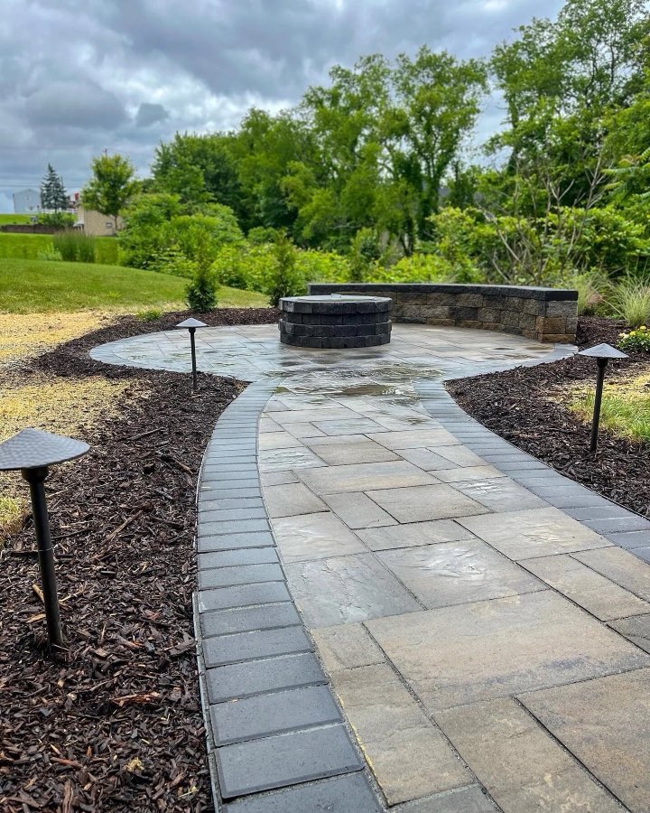 Paver patio with seating wall and fire pit
