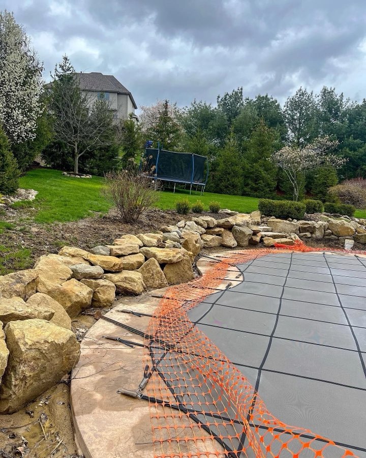 Boulder retaining wall on a hillside